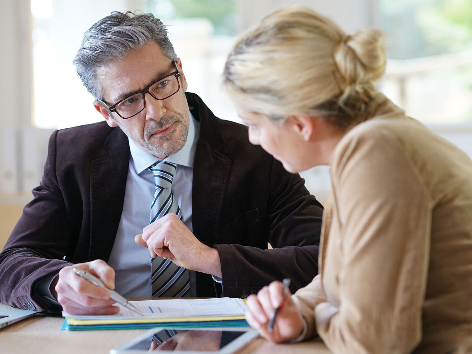 Woman meeting notary for advice
